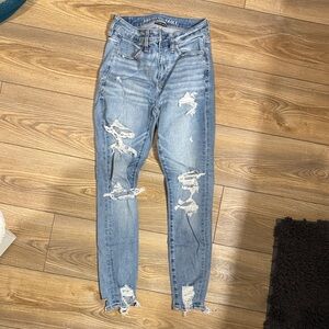 American Eagle Outfitters Women's High Rise Light Blue Distressed Jeans